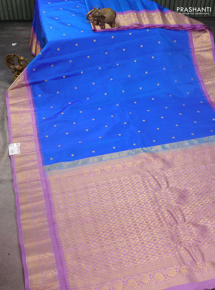 Pure gadwal silk saree blue and lavender with zari woven buttas and temple design zari woven border