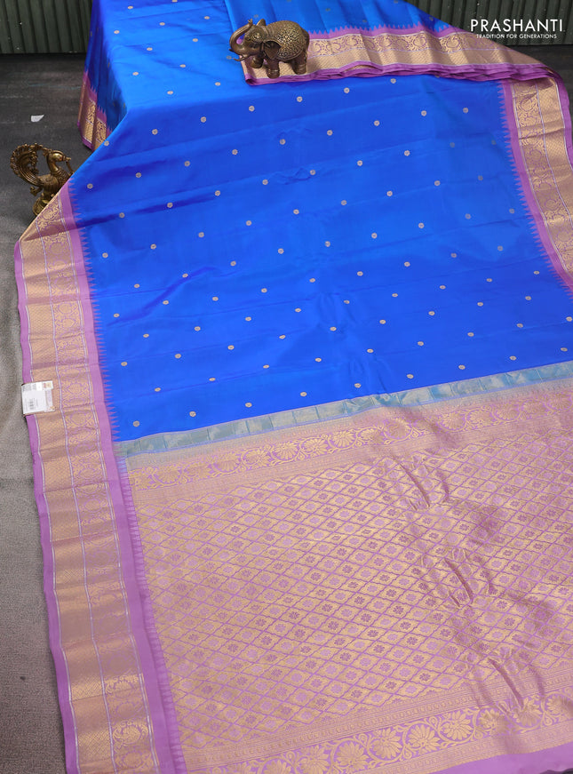 Pure gadwal silk saree blue and lavender with zari woven buttas and temple design zari woven border