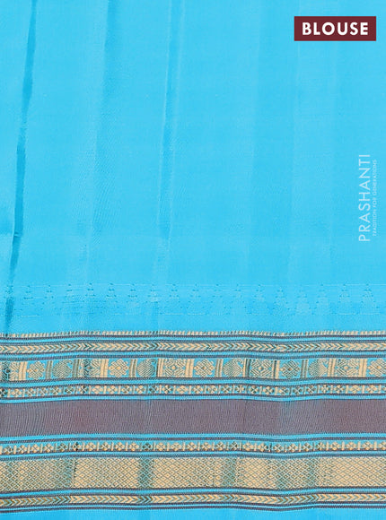 Pure gadwal silk saree dual shade of peach and teal blue with allover zari checked pattern and temple design zari woven border