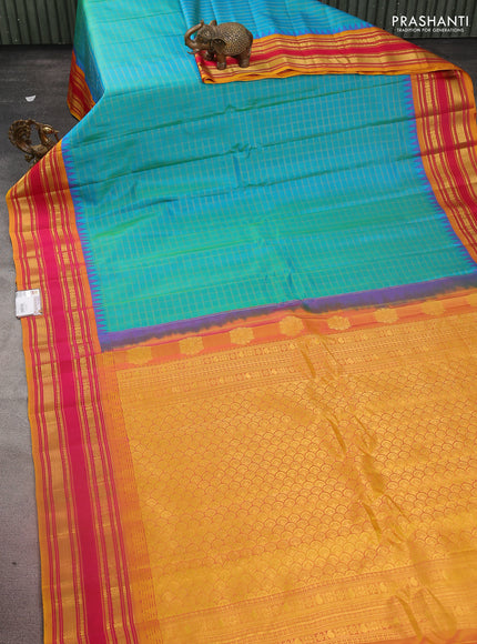 Pure gadwal silk saree dual shade of teal green and pink with allover zari checked pattern and temple design zari woven border