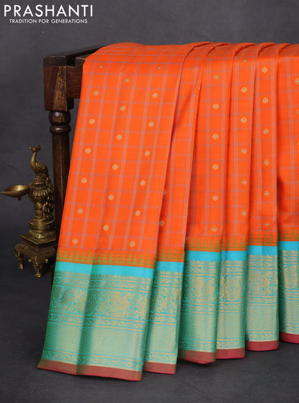Pure gadwal silk saree orange and dual shade of teal bluish green with allover checked pattern & zari buttas and temple design zari woven border