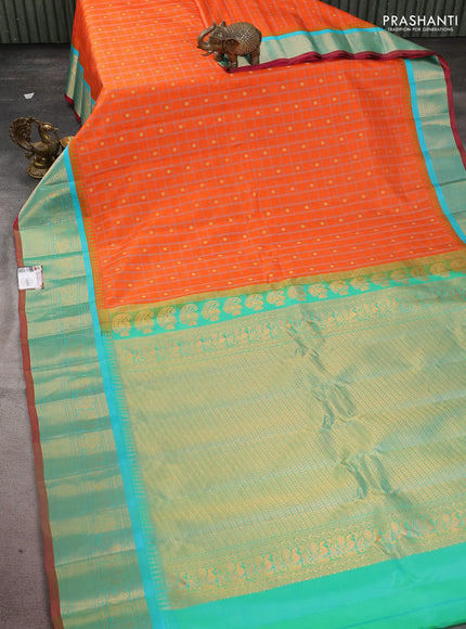 Pure gadwal silk saree orange and dual shade of teal bluish green with allover checked pattern & zari buttas and temple design zari woven border
