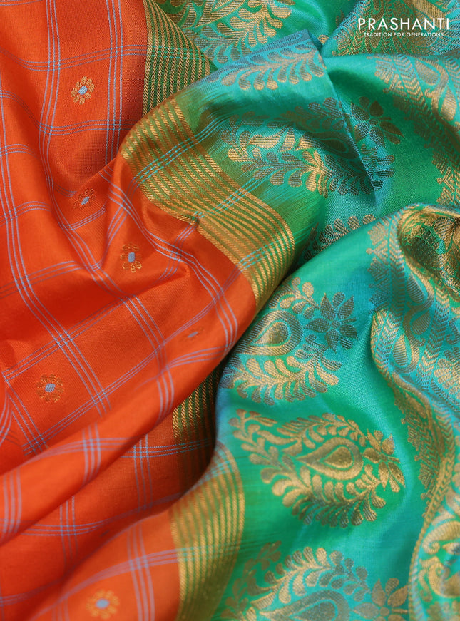 Pure gadwal silk saree orange and dual shade of teal bluish green with allover checked pattern & zari buttas and temple design zari woven border