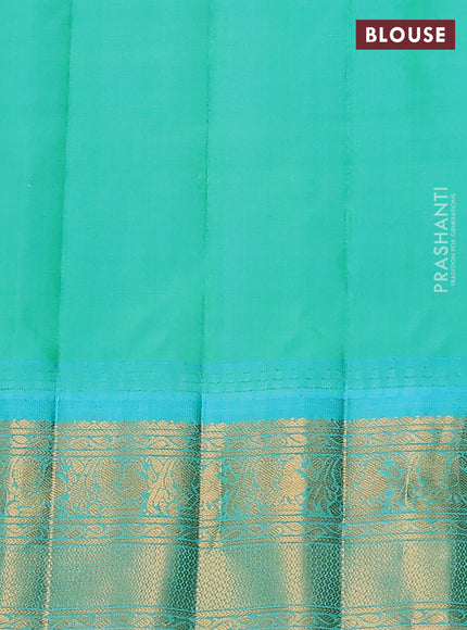Pure gadwal silk saree orange and dual shade of teal bluish green with allover checked pattern & zari buttas and temple design zari woven border