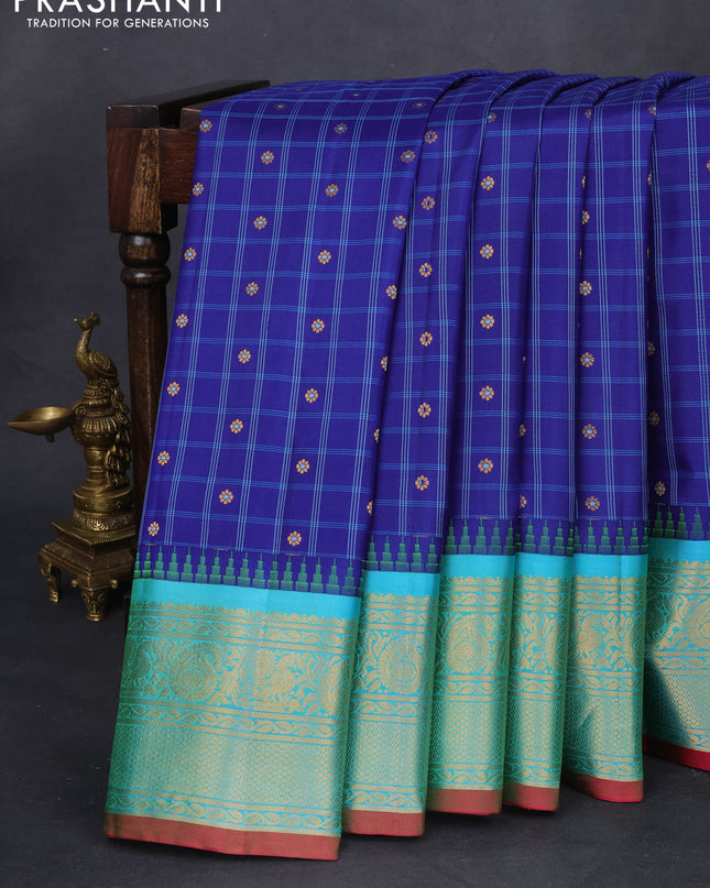 Pure gadwal silk saree blue and teal blue with allover checked pattern & zari buttas and temple design zari woven border
