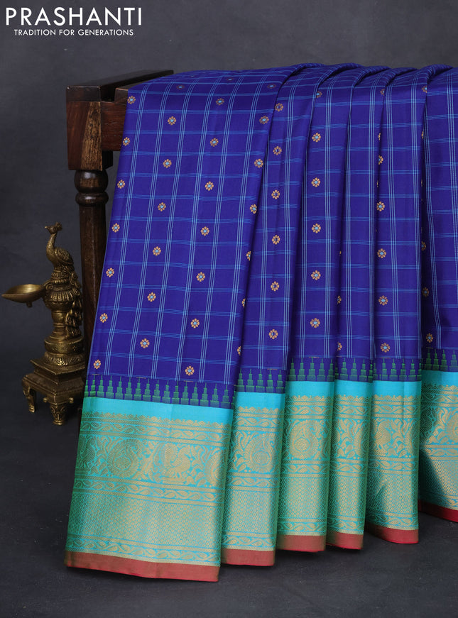 Pure gadwal silk saree blue and teal blue with allover checked pattern & zari buttas and temple design zari woven border