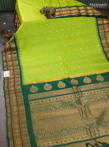 Pure gadwal silk saree dual shade of light green and green with zari woven paisley buttas and temple design zari woven border