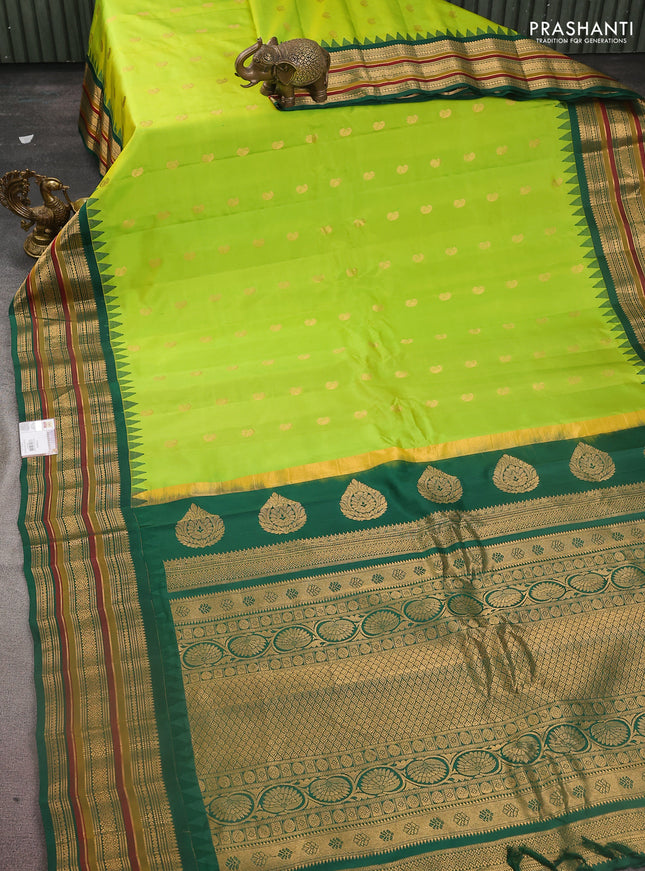 Pure gadwal silk saree dual shade of light green and green with zari woven paisley buttas and temple design zari woven border