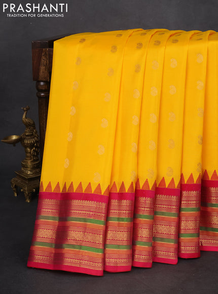 Pure gadwal silk saree yellow and pink with zari woven paisley buttas and temple design zari woven border