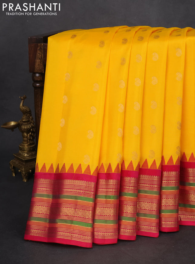 Pure gadwal silk saree yellow and pink with zari woven paisley buttas and temple design zari woven border