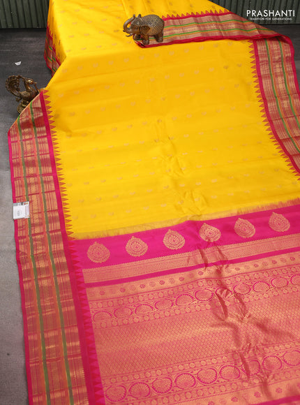 Pure gadwal silk saree yellow and pink with zari woven paisley buttas and temple design zari woven border