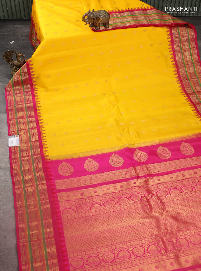 Pure gadwal silk saree yellow and pink with zari woven paisley buttas and temple design zari woven border