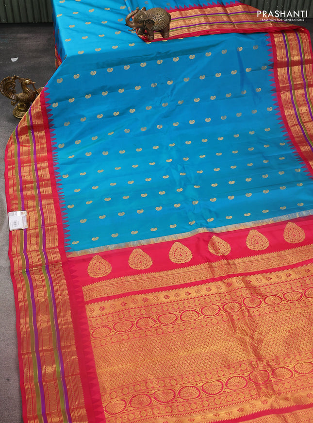 Pure gadwal silk saree cs blue and pink with zari woven paisley buttas and temple design zari woven border