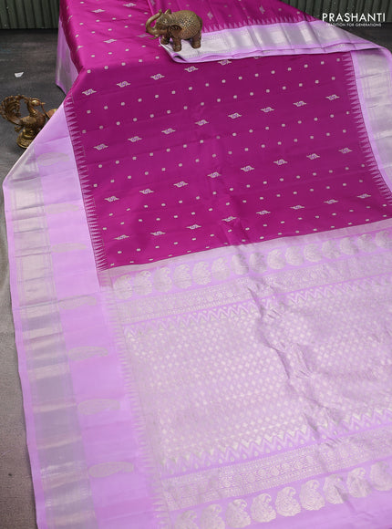 Pure gadwal silk saree purple and lavender with allover silver zari woven buttas and long paisley design silver zari woven border