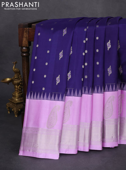 Pure gadwal silk saree navy blue and lavender with allover silver zari woven buttas and long paisley design silver zari woven border