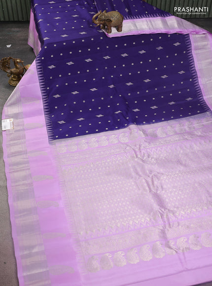 Pure gadwal silk saree navy blue and lavender with allover silver zari woven buttas and long paisley design silver zari woven border