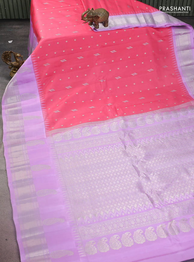 Pure gadwal silk saree dark peach pink and lavender with allover silver zari woven buttas and long paisley design silver zari woven border