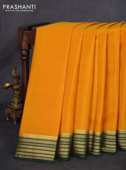 Pure mysore silk saree mango yellow and dark green with plain body and zari woven border