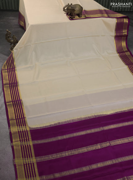 Pure mysore silk saree cream and purple with plain body and zari woven border