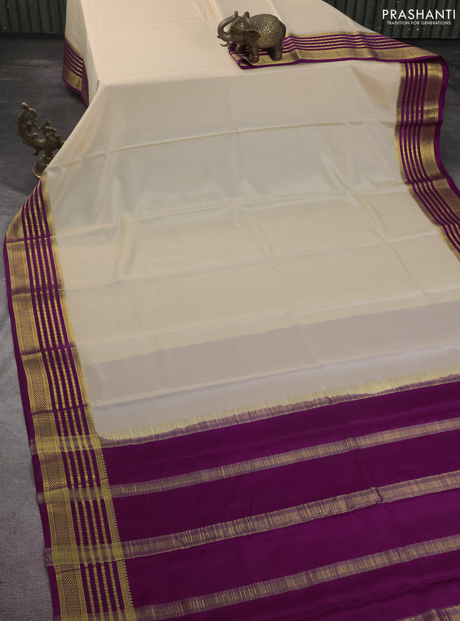 Pure mysore silk saree cream and purple with plain body and zari woven border