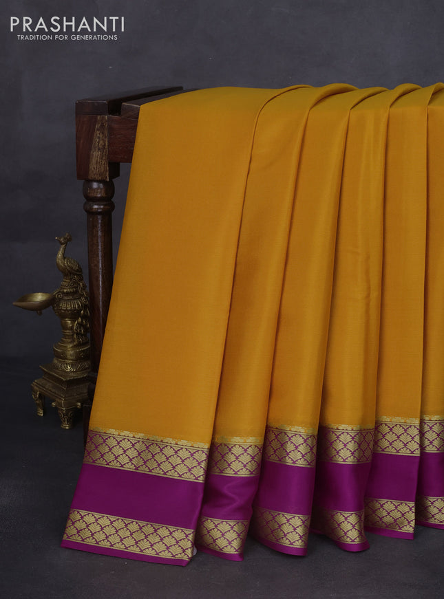 Pure mysore silk saree mango yellow and purple with plain body and rettapet zari woven border