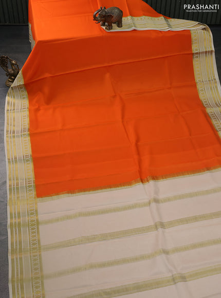 Pure mysore silk saree orange and cream with plain body and zari woven border
