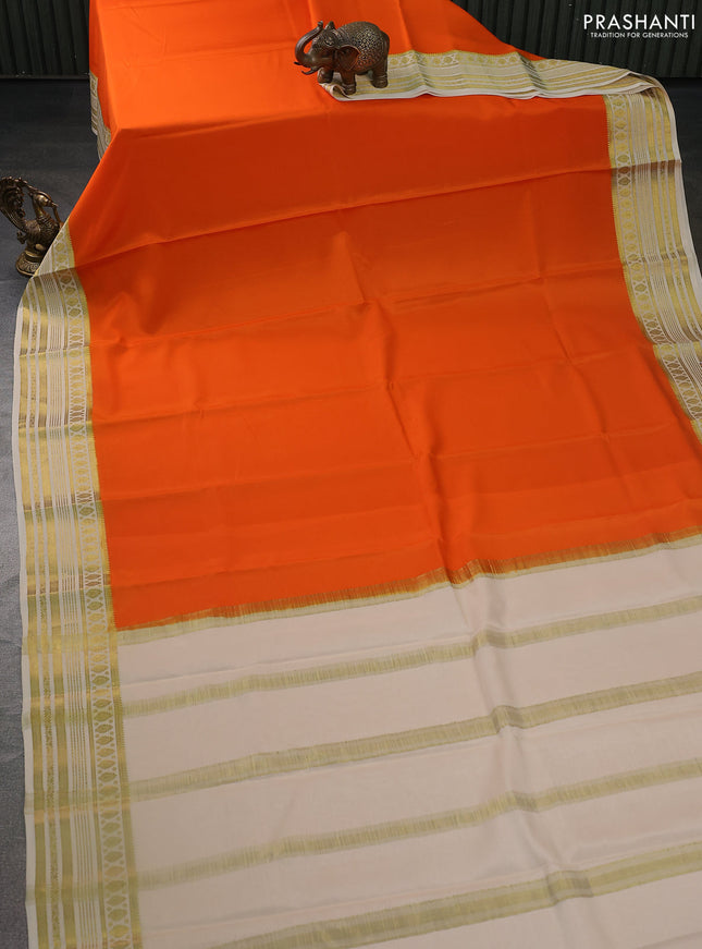 Pure mysore silk saree orange and cream with plain body and zari woven border