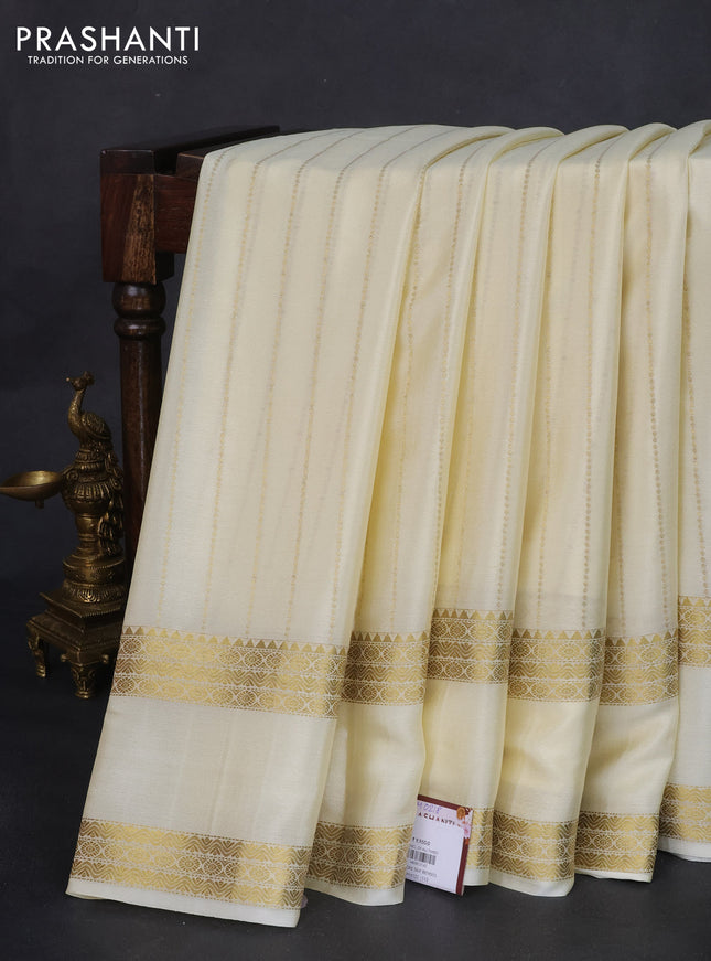 Pure mysore silk saree cream with allover zari weaves and rettapet zari woven border