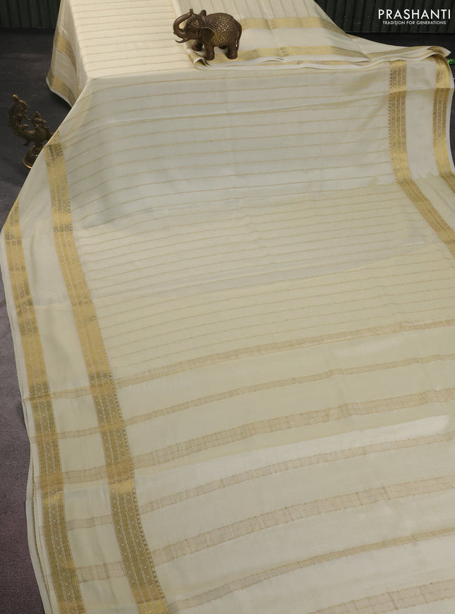 Pure mysore silk saree cream with allover zari weaves and rettapet zari woven border