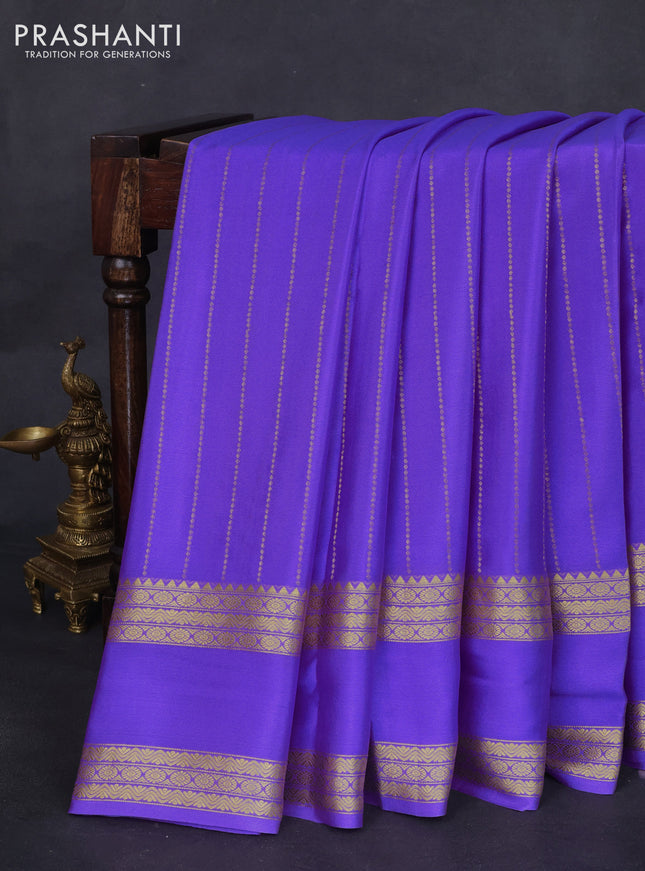 Pure mysore silk saree lavender with allover zari weaves and rettapet zari woven border