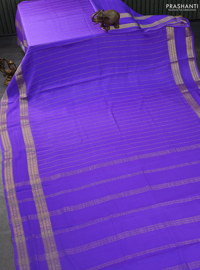 Pure mysore silk saree lavender with allover zari weaves and rettapet zari woven border