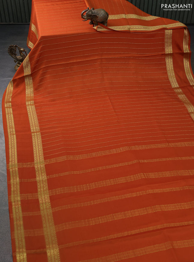 Pure mysore silk saree dark mustard with allover zari weaves and rettapet zari woven border