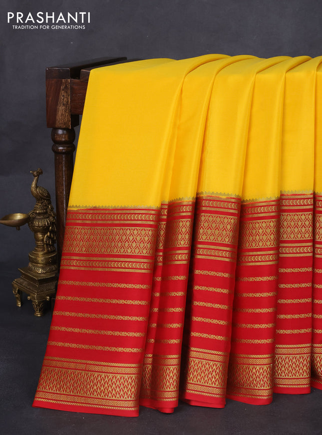 Pure mysore silk saree yellow and red with plain body and long zari woven border