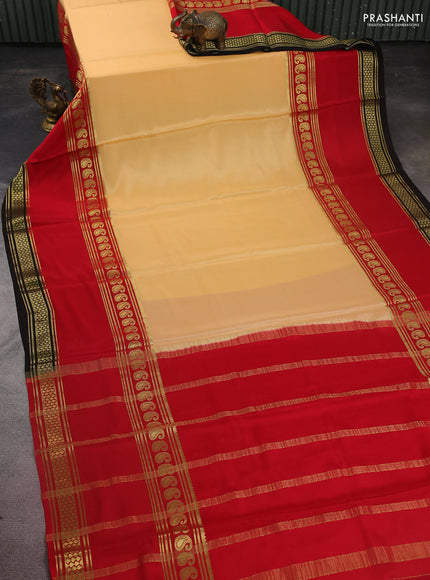 Pure mysore silk saree pale orange and red black with plain body and long rettapet zari woven border