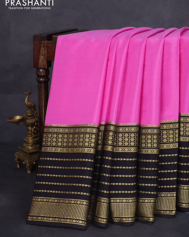 Pure mysore silk saree light pink and black with plain body and long zari woven border