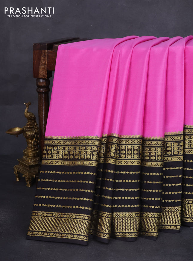 Pure mysore silk saree light pink and black with plain body and long zari woven border