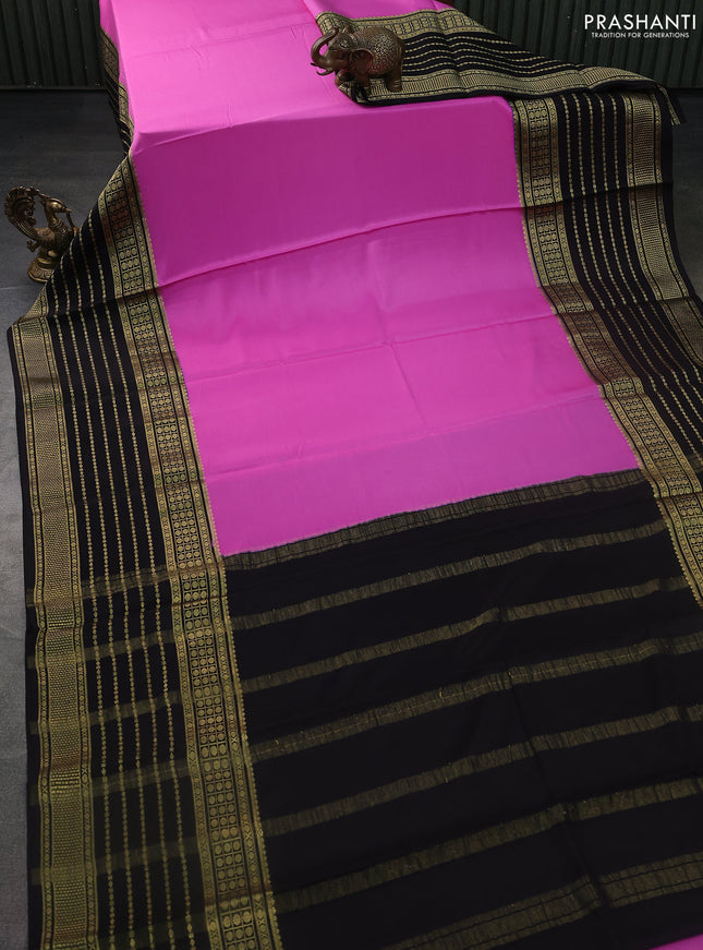 Pure mysore silk saree light pink and black with plain body and long zari woven border