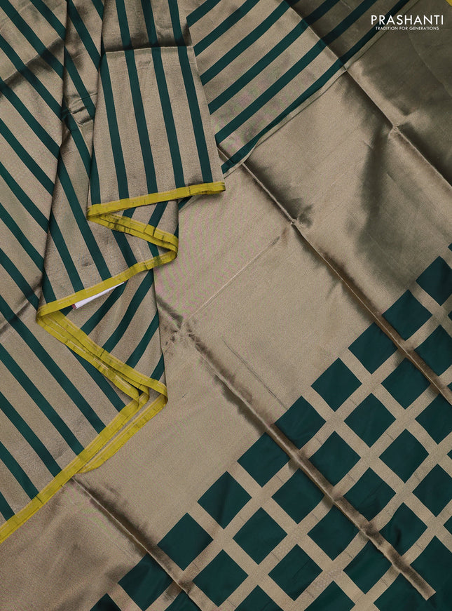 Banarasi tissue partly saree gold and green with plain body and piping border