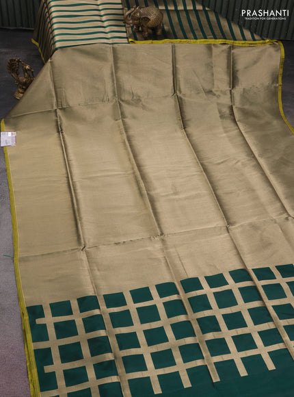 Banarasi tissue partly saree gold and green with plain body and piping border