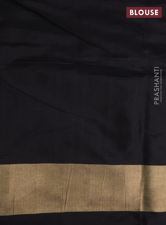 Banarasi tissue partly saree gold and black with plain body and piping border