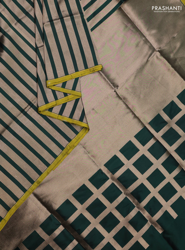 Banarasi tissue partly saree gold and green with plain body and piping border