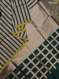 Banarasi tissue partly saree gold and green with plain body and piping border