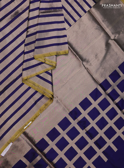 Banarasi tissue partly saree gold and navy blue with plain body and piping border