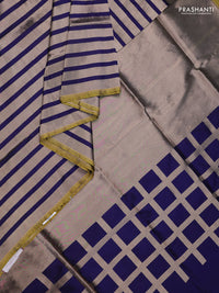Banarasi tissue partly saree gold and navy blue with plain body and piping border