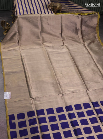 Banarasi tissue partly saree gold and navy blue with plain body and piping border