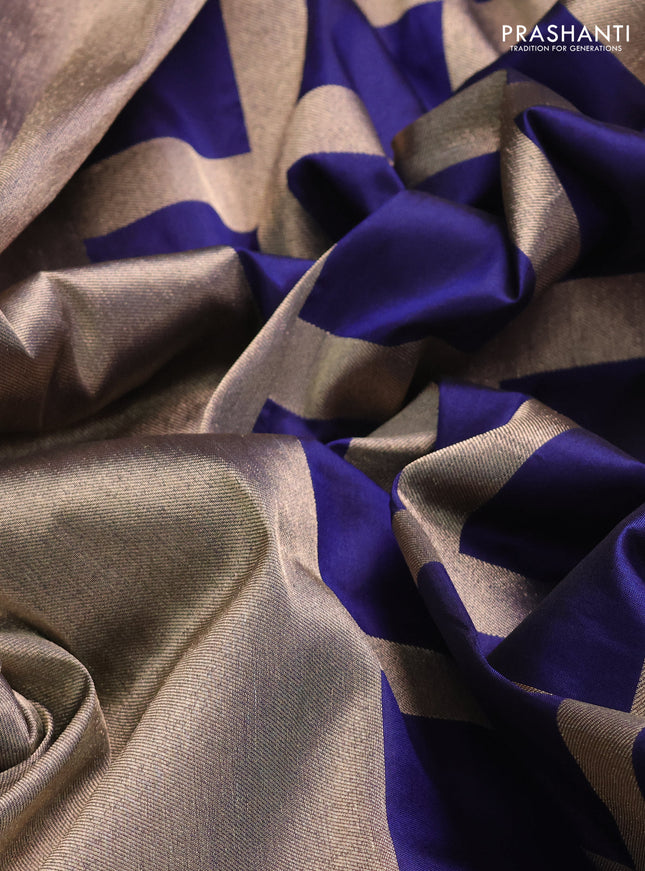 Banarasi tissue partly saree gold and navy blue with plain body and piping border
