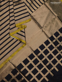 Banarasi tissue partly saree gold and black with plain body and piping border