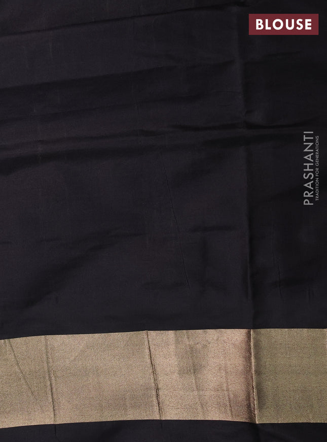 Banarasi tissue partly saree gold and black with plain body and piping border