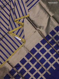 Banarasi tissue partly saree gold and navy blue with plain body and piping border