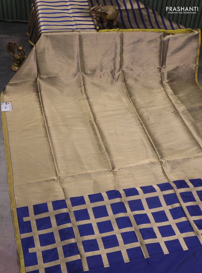 Banarasi tissue partly saree gold and navy blue with plain body and piping border